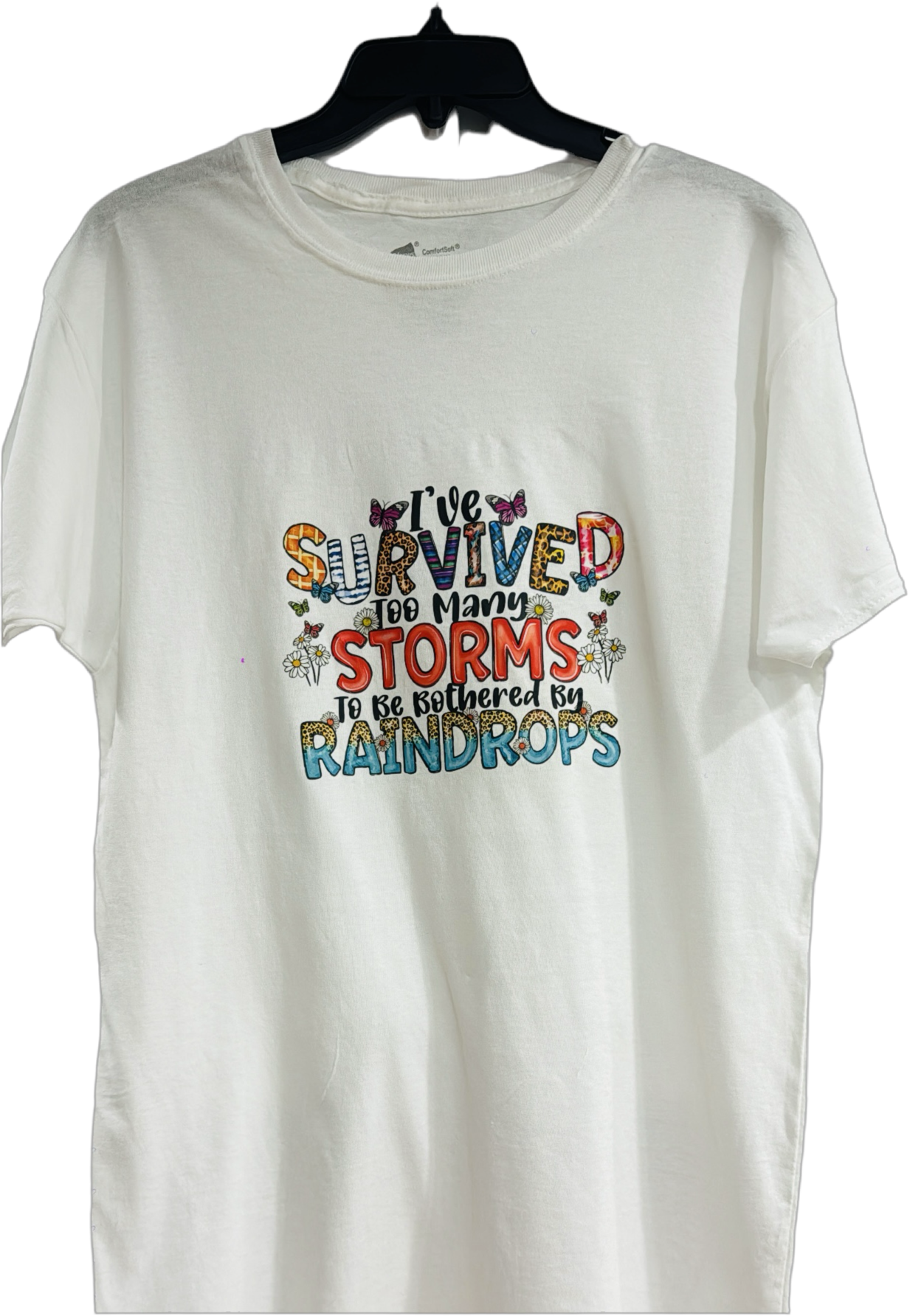 I HAVE SURVIVED TOO MANY STORMS TO BE BOTHERED BY RAINDROPS WHITE T-SHIRT