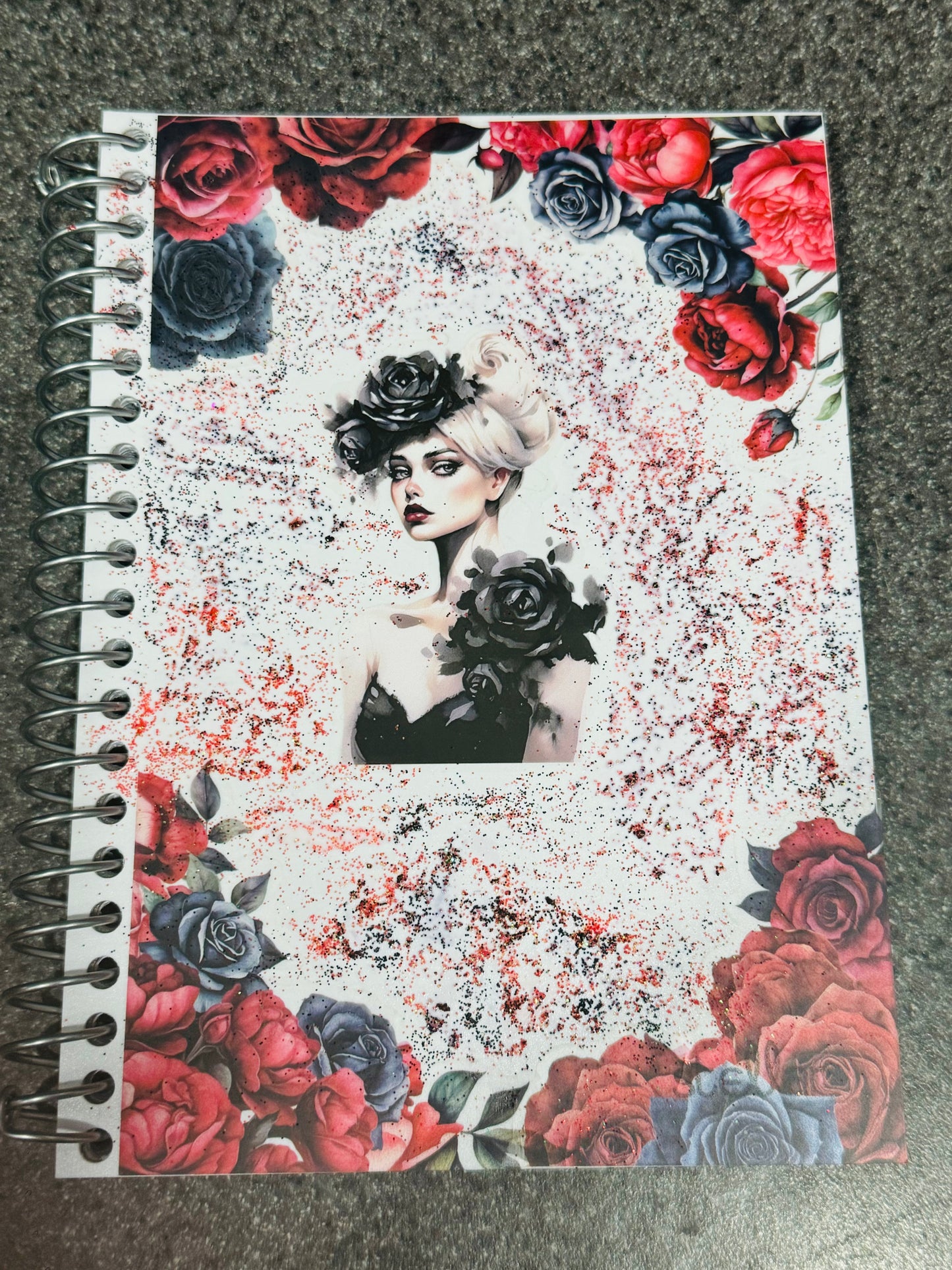 BLACK WIDOW IN A ROSE GARDEN